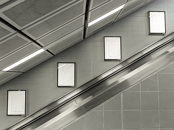 Empty ads on Underground escalator